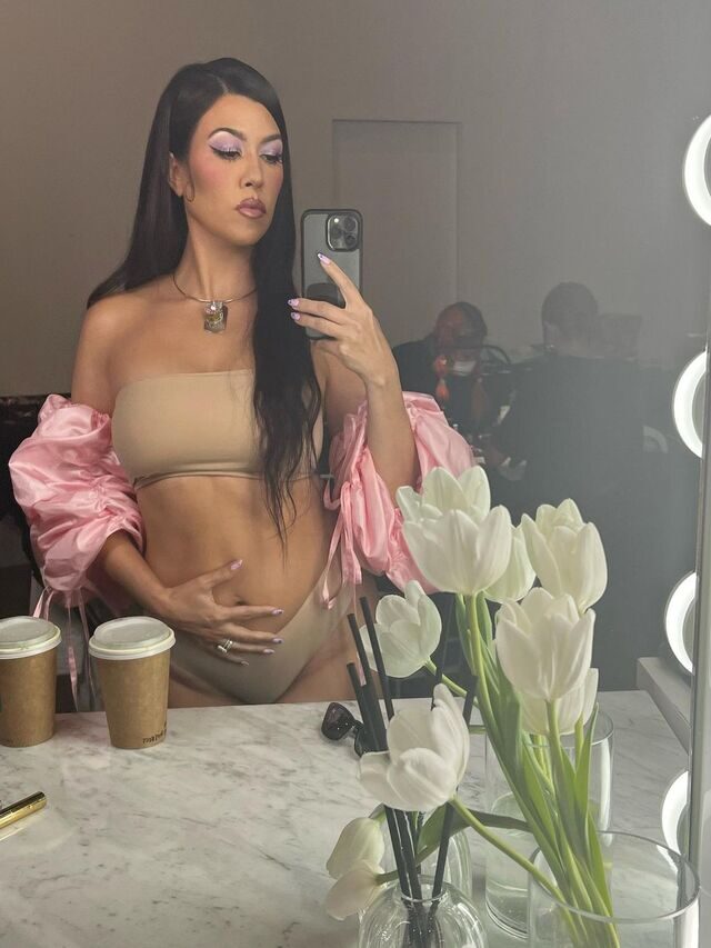 Kourtney Kardashian claps back at pregnancy speculation after lingerie pic